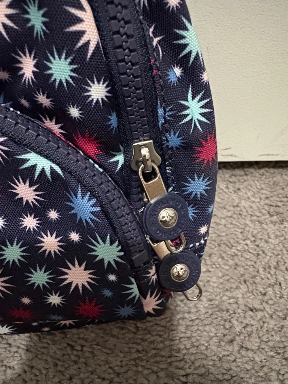 Kipling Navy Starburst Pattern Mini Backpack with Multicolor Accents
